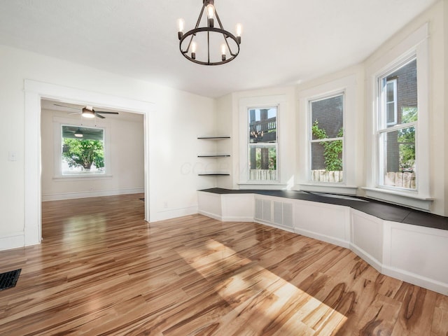 534 Berkeley Rd, Columbus, OH 43205 - unfurnished dining area featuring light wood finished floors and a chandelier