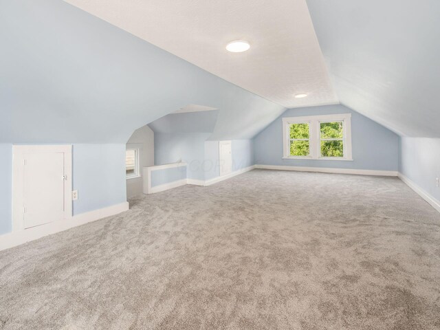 534 Berkeley Rd, Columbus, OH 43205 - bonus room with vaulted ceiling, baseboards, and carpet floors