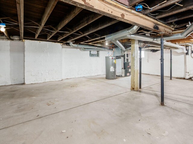 534 Berkeley Rd, Columbus, OH 43205 - unfinished below grade area featuring water heater and heating unit