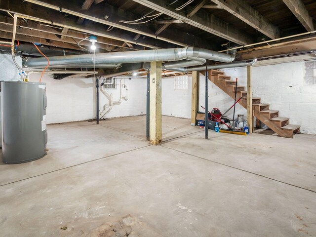 534 Berkeley Rd, Columbus, OH 43205 - unfinished below grade area with electric water heater and stairway