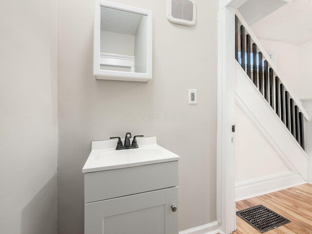 534 Berkeley Rd, Columbus, OH 43205 - bathroom featuring vanity and wood finished floors