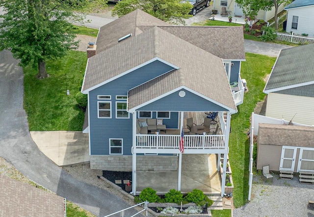 11177 Sassafrass Rd, Lakeview, OH 43331 - back of house featuring a shingled roof and a chimney