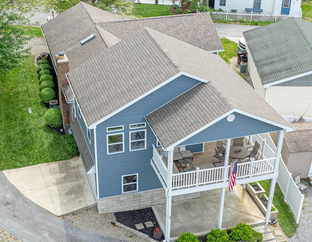 11177 Sassafrass Rd, Lakeview, OH 43331 - view of front of house featuring a patio area, a shingled roof, and a deck