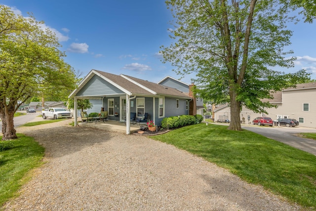 11177 Sassafrass Rd, Lakeview, OH 43331 - view of front of home featuring covered porch and a front yard
