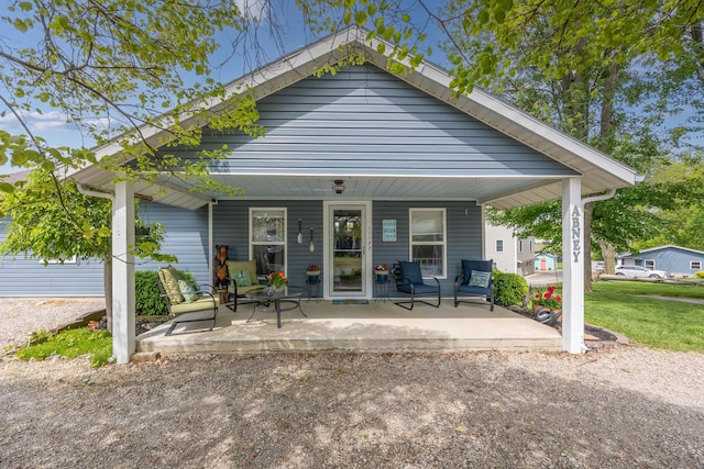 11177 Sassafrass Rd, Lakeview, OH 43331 - back of house with covered porch