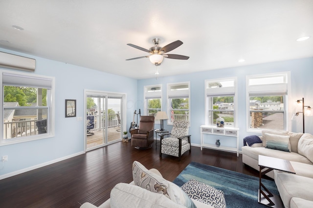 11177 Sassafrass Rd, Lakeview, OH 43331 - living room with a wall mounted air conditioner, baseboards, ceiling fan, wood finished floors, and recessed lighting
