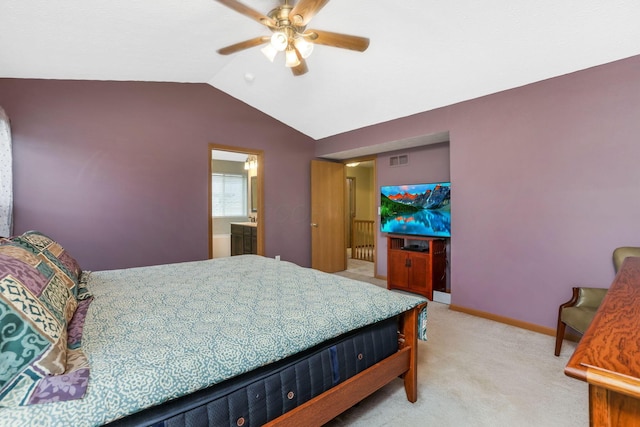 5409 Wellcrest Ct, Galloway, OH 43119 - bedroom featuring lofted ceiling, light carpet, a ceiling fan, baseboards, and ensuite bath
