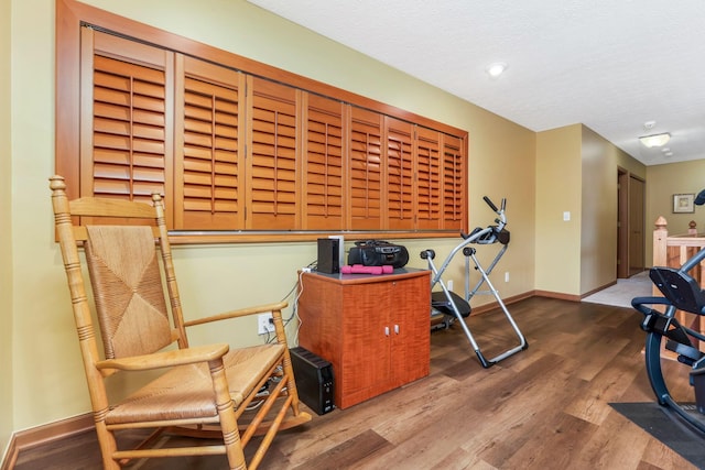 5409 Wellcrest Ct, Galloway, OH 43119 - exercise area with wood finished floors, baseboards, a textured ceiling, and recessed lighting