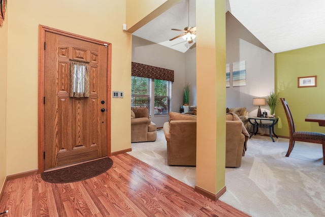 5409 Wellcrest Ct, Galloway, OH 43119 - entrance foyer featuring high vaulted ceiling, baseboards, light wood-style floors, and ceiling fan