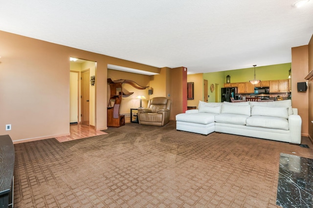 5409 Wellcrest Ct, Galloway, OH 43119 - carpeted living room with baseboards