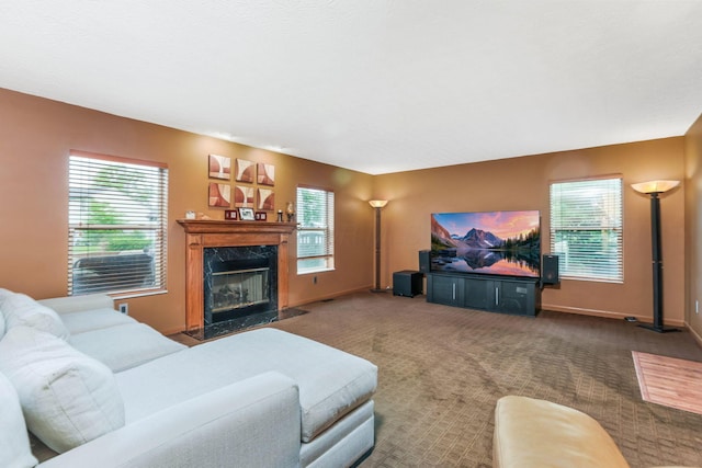 5409 Wellcrest Ct, Galloway, OH 43119 - carpeted living room with a high end fireplace, plenty of natural light, and baseboards