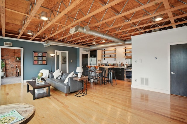 956 N High St Unit 2W, Columbus, OH 43201 - living room with light wood-style flooring