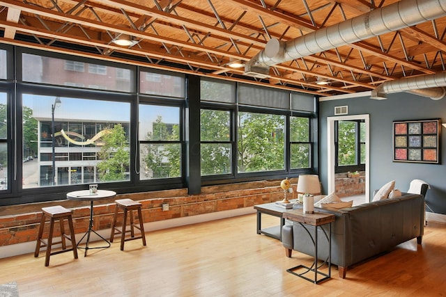 956 N High St Unit 2W, Columbus, OH 43201 - living area featuring hardwood / wood-style floors