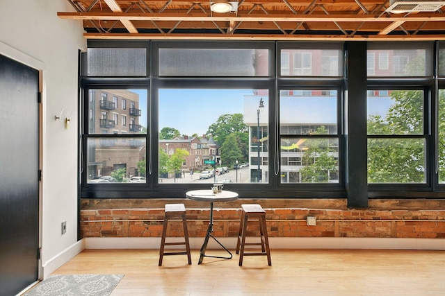 956 N High St Unit 2W, Columbus, OH 43201 - dining room with wood finished floors and baseboards