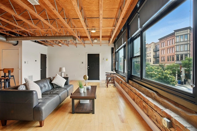 956 N High St Unit 2W, Columbus, OH 43201 - living area featuring hardwood / wood-style floors and baseboards