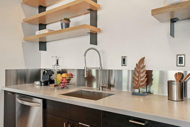 956 N High St Unit 2W, Columbus, OH 43201 - kitchen with open shelves, light countertops, stainless steel dishwasher, and dark brown cabinetry