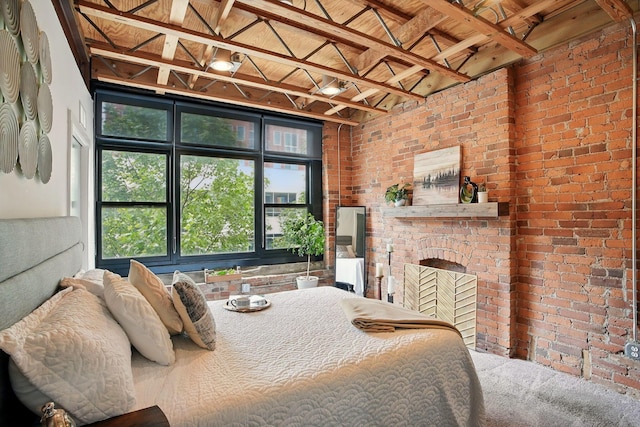 956 N High St Unit 2W, Columbus, OH 43201 - bedroom with brick wall and multiple windows