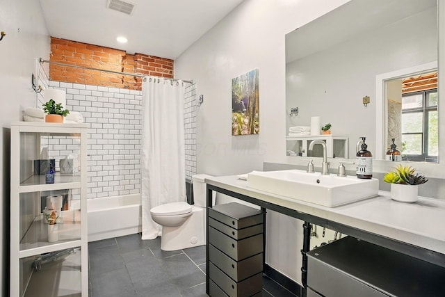 956 N High St Unit 2W, Columbus, OH 43201 - bathroom with tile patterned flooring, vanity, and shower / tub combo with curtain