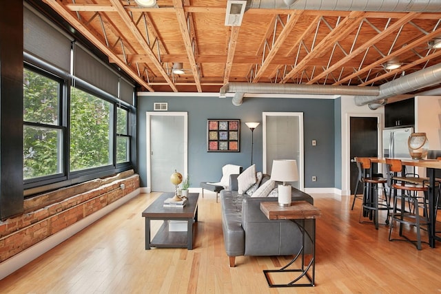 956 N High St Unit 2W, Columbus, OH 43201 - living room featuring wood finished floors