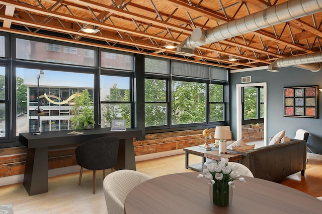 956 N High St Unit 2W, Columbus, OH 43201 - dining space featuring wood finished floors