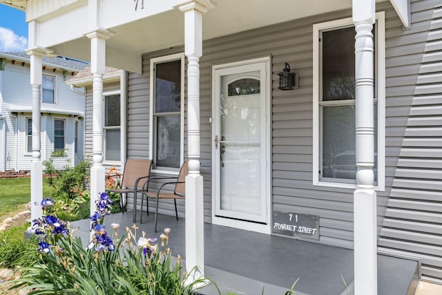 71 Market St, Carroll, OH 43112 - view of exterior entry featuring a porch
