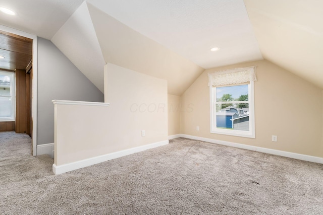 71 Market St, Carroll, OH 43112 - additional living space featuring carpet floors, lofted ceiling, and baseboards