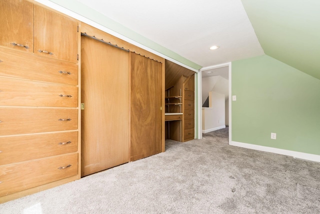 71 Market St, Carroll, OH 43112 - bonus room with vaulted ceiling, carpet, baseboards, and recessed lighting