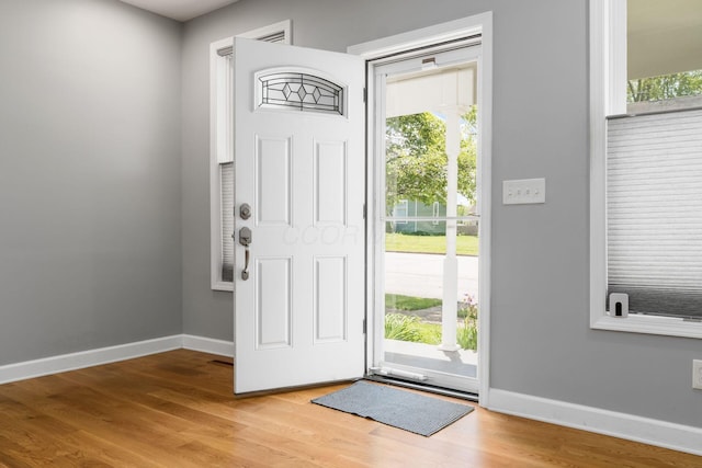 71 Market St, Carroll, OH 43112 - entrance foyer with plenty of natural light, baseboards, and wood finished floors