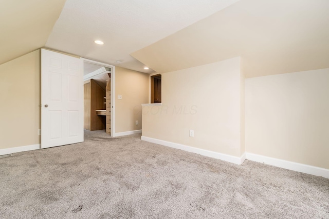 71 Market St, Carroll, OH 43112 - additional living space featuring carpet floors, recessed lighting, baseboards, and lofted ceiling