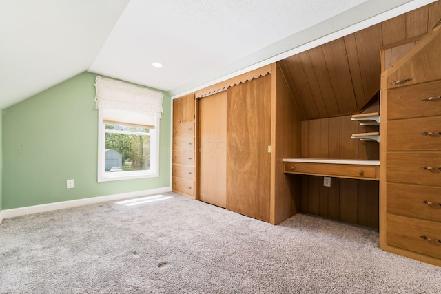 71 Market St, Carroll, OH 43112 - bonus room with vaulted ceiling, carpet floors, and baseboards