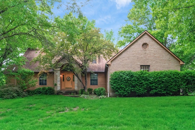 248 Academy Woods Dr, Columbus, OH 43230 - view of front facade with a front yard and brick siding