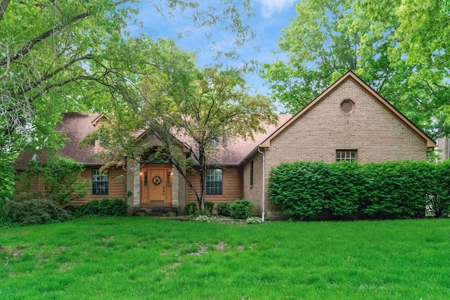248 Academy Woods Dr, Columbus, OH 43230 - view of front facade with a front yard and brick siding