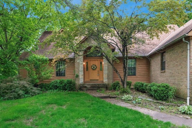 248 Academy Woods Dr, Columbus, OH 43230 - view of front of home featuring a front lawn