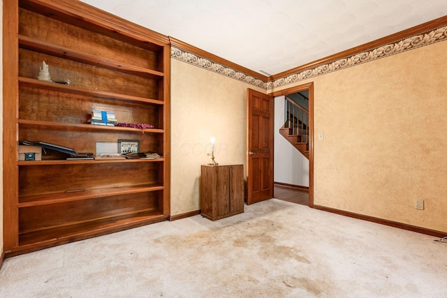 248 Academy Woods Dr, Columbus, OH 43230 - carpeted spare room featuring baseboards, ornamental molding, and stairs