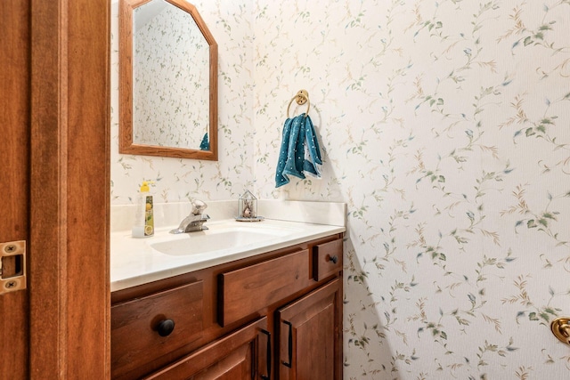 248 Academy Woods Dr, Columbus, OH 43230 - bathroom featuring wallpapered walls and vanity