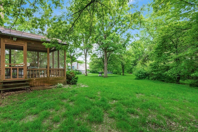 248 Academy Woods Dr, Columbus, OH 43230 - view of green lawn with a sunroom