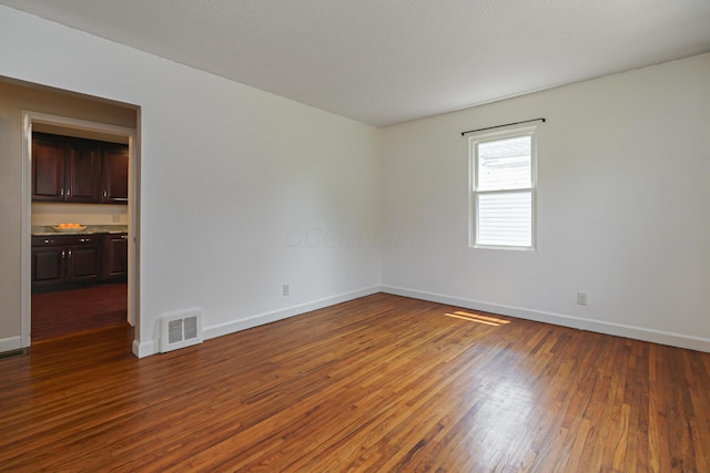 68 N Broadleigh Rd, Columbus, OH 43209 - spare room with dark wood finished floors and baseboards