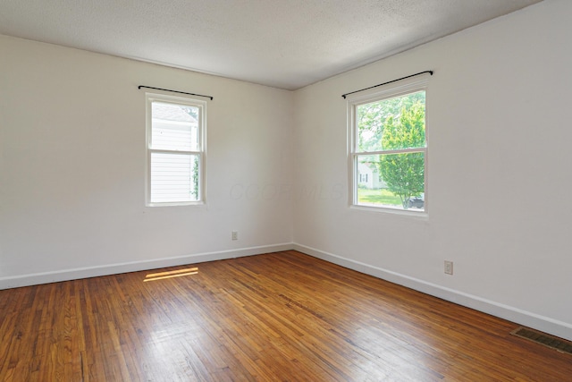 68 N Broadleigh Rd, Columbus, OH 43209 - empty room featuring healthy amount of natural light and wood-type flooring