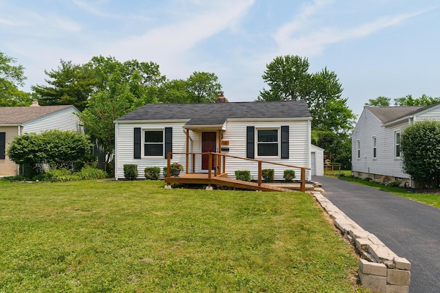 68 N Broadleigh Rd, Columbus, OH 43209 - view of front of home with a front lawn and a chimney