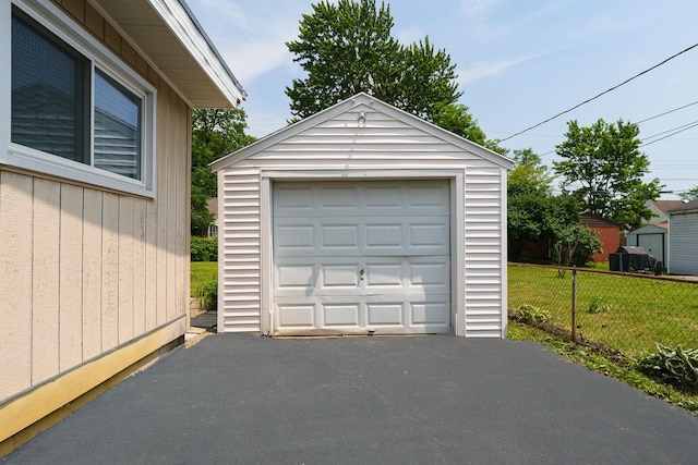68 N Broadleigh Rd, Columbus, OH 43209 - detached garage featuring asphalt driveway
