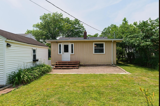 68 N Broadleigh Rd, Columbus, OH 43209 - back of property featuring a chimney and a lawn