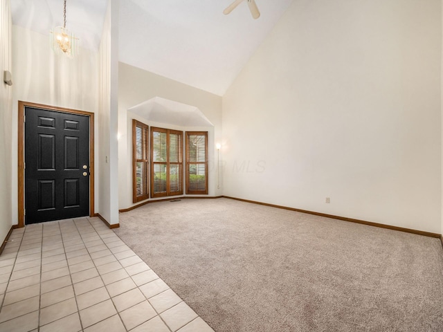 1288 Millstone Sq, Westerville, OH 43081 - foyer entrance with light carpet, high vaulted ceiling, baseboards, and light tile patterned flooring