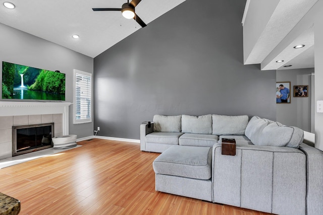 9556 Ireland Ct, Powell, OH 43065 - living area with ceiling fan, wood finished floors, recessed lighting, high vaulted ceiling, and baseboards