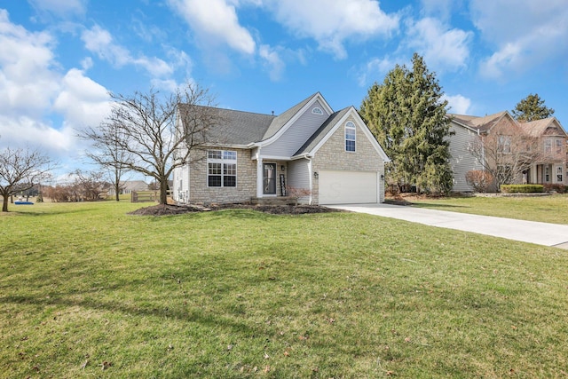 9556 Ireland Ct, Powell, OH 43065 - view of front facade with driveway, a front yard, and stone siding