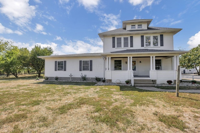 22119 State Route 104, Circleville, OH 43113 - american foursquare style home with a porch and a front yard