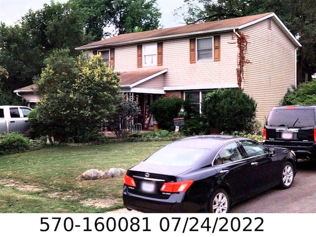 2117 Drumlin Dr, Grove City, OH 43123 - view of front facade with a front lawn