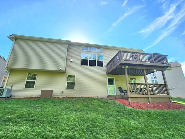 8701 Creekwood Pl, Canal Winchester, OH 43110 - back of property with a lawn, central AC unit, and a wooden deck