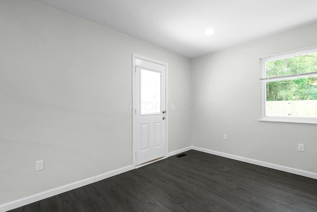 2751 Baker Ave, Cincinnati, OH 45211 - empty room featuring dark wood-style flooring and baseboards