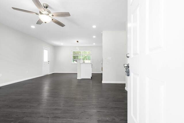 2751 Baker Ave, Cincinnati, OH 45211 - spare room with a ceiling fan, recessed lighting, dark wood-type flooring, and baseboards