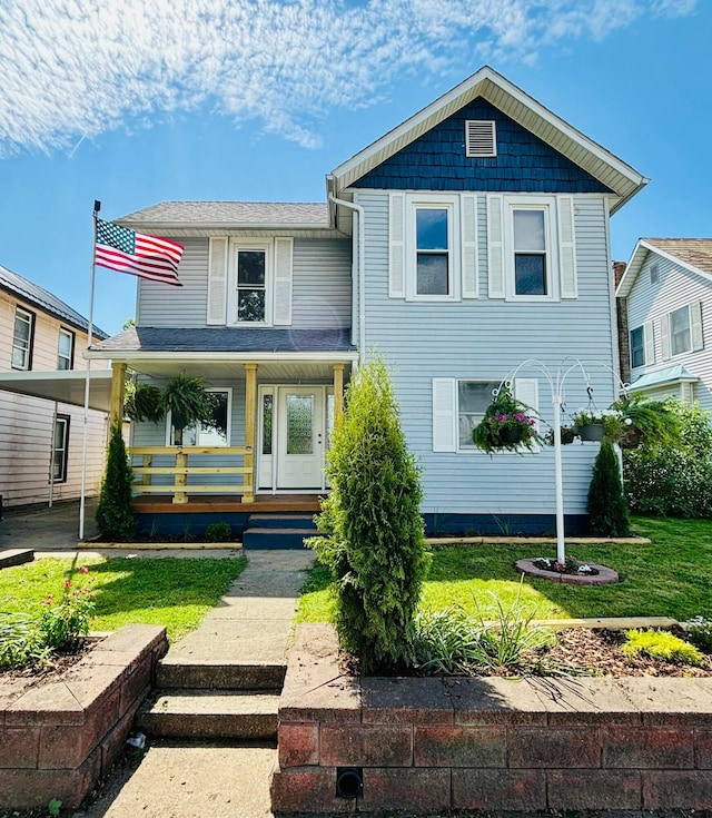 179 Boyleston Ave, Newark, OH 43055 - view of front facade featuring a front lawn and a porch